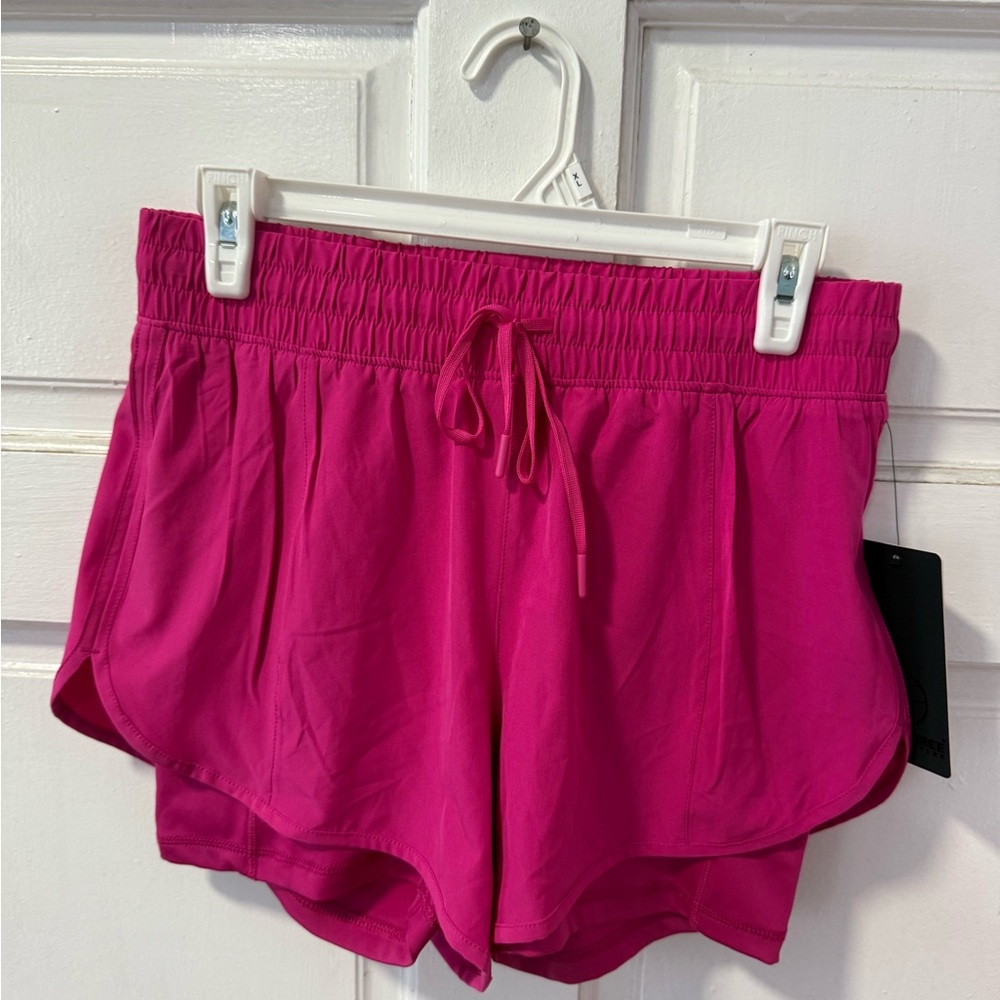 90 Degree By Reflex Magenta Athletic Shorts with Dolphin Hem